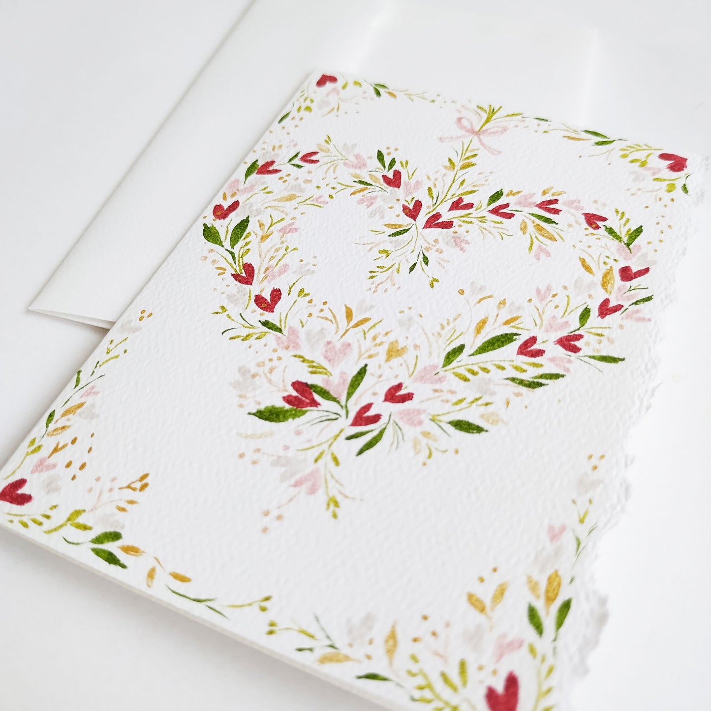 Five Patch Design Original Botanical Heart Greeting Card and envelope shown at an angle